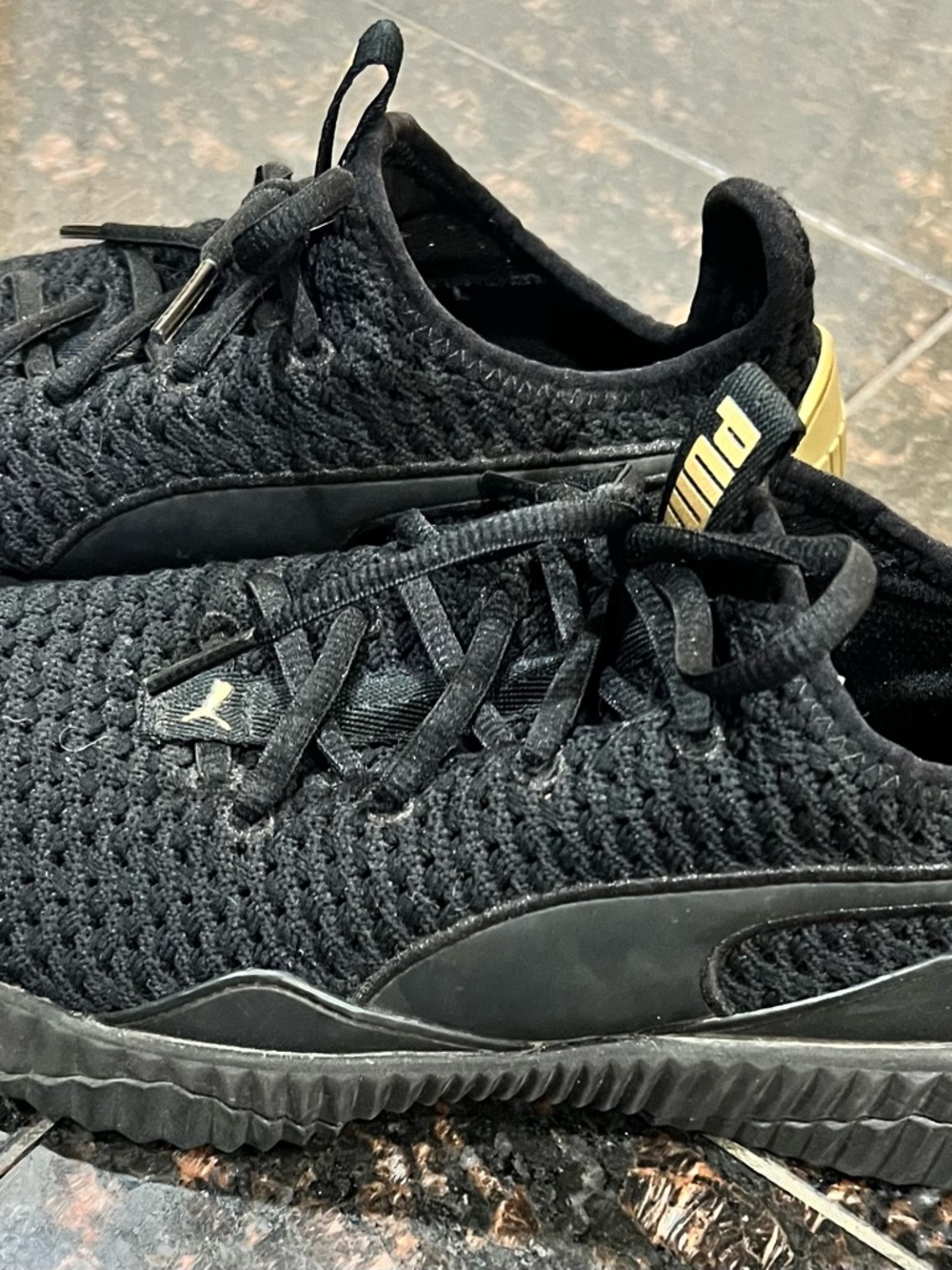 Puma Black Knit Athletic Sneakers with Gold Heel Accent